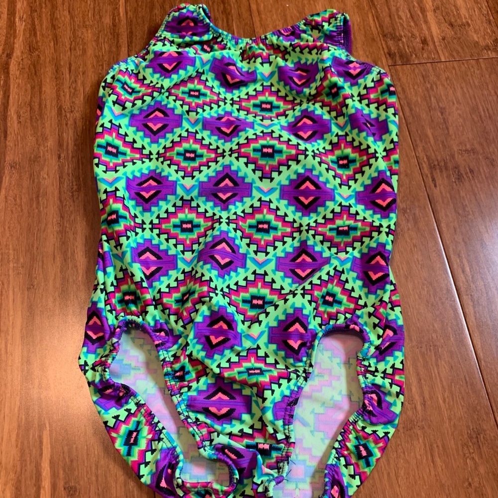 green and purple designed leo